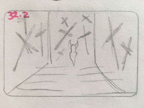 Drawing. A rectangular storyboard drawn in pencil blocks out the location of a person in front of walls filled with crosses. A notation in pink marker at the top left reads “32.2”.